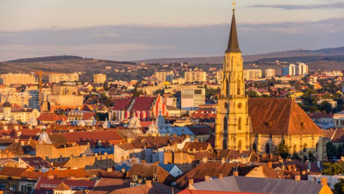 Sibiu, județ, profit, cifră de afaceri, top companii, Romgaz, Transgaz, economie, industrie, energie, gaze naturale, transport, infrastructură, investiții, dezvoltare, poziție geografică, Mediaș, Continental, Marquardt, automotive, componente, export, piață europeană, locuri de muncă, retail, comerț, centre comerciale, turism, ospitalitate, tehnologii moderne, forță de muncă, calificare, transport rutier, transport feroviar, aeroport, stabilitate, autorități locale, investitori străini, Cluj, Timiș, sector IT, industrii creative, producție industrială, eficiență, resurse, valoare adăugată, taxe, impozite, buget local, comunitate, responsabilitate socială, școli, spitale, cultură, lipsă forță de muncă, fluctuații economice, lanț aprovizionare, perspective, 2024, 2025, model economic, inovație, tradiție, competitivitate, performanță, sustenabilitate, exporturi, importuri, piață globală, business, leadership, administrație, creștere economică, PIB local, salarii, productivitate, brand județ, dezvoltare regională, colaborări, parteneriate, finanțare, capital, profitabilitate, raport financiar, audit, acționari, investitori, bursă, listare, planuri strategice, rețea logistică, distribuție, marketing, brand, competitivitate globală, mediu de afaceri, climat economic.